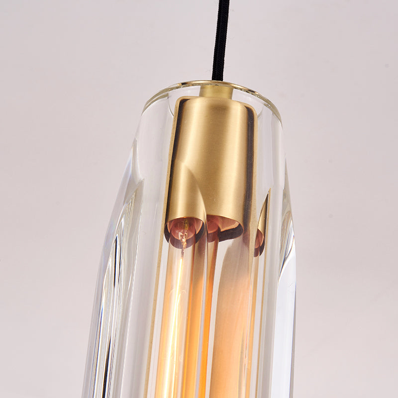 Abat-jour en cristal cylindrique, élément laiton brossé et câble noir.
