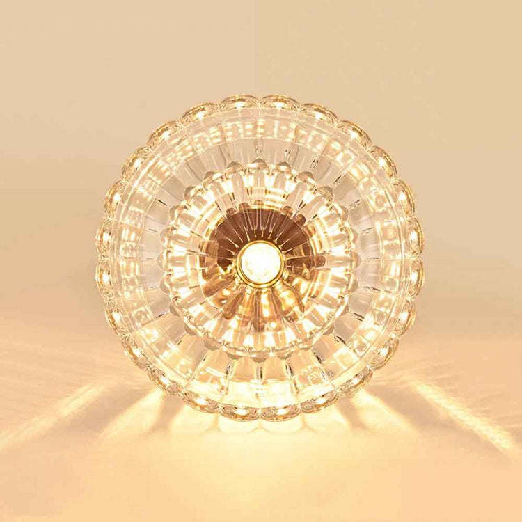 Plafonnier 1 lumière, dôme en verre transparent lumineux, monture dorée.