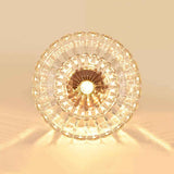 Plafonnier 1 lumière, dôme en verre transparent lumineux, monture dorée.