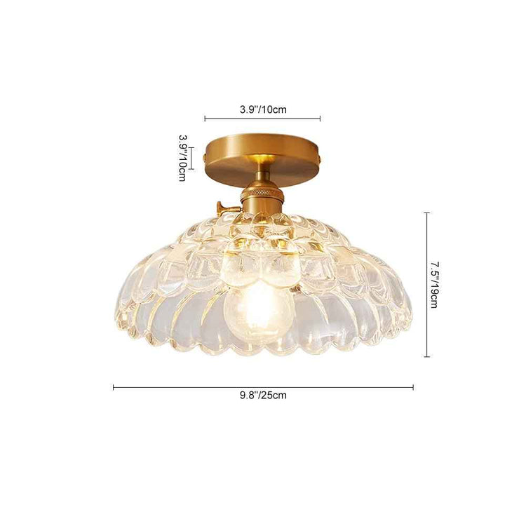Plafonnier 1 lumière : dôme en verre transparent, H 10 cm, L 25 cm.