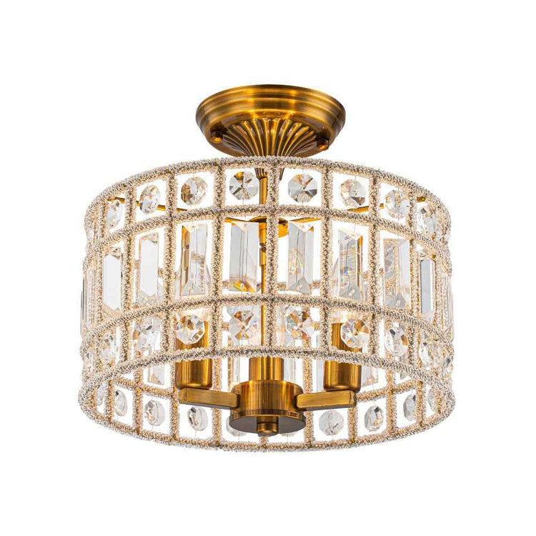 Plafonnier tambour en cristal et laiton à 3 lumières, vue inclinée.