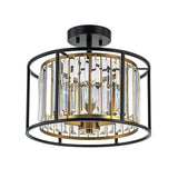 Plafonnier noir à cadre rond et cylindres en verre, ampoules allumées.