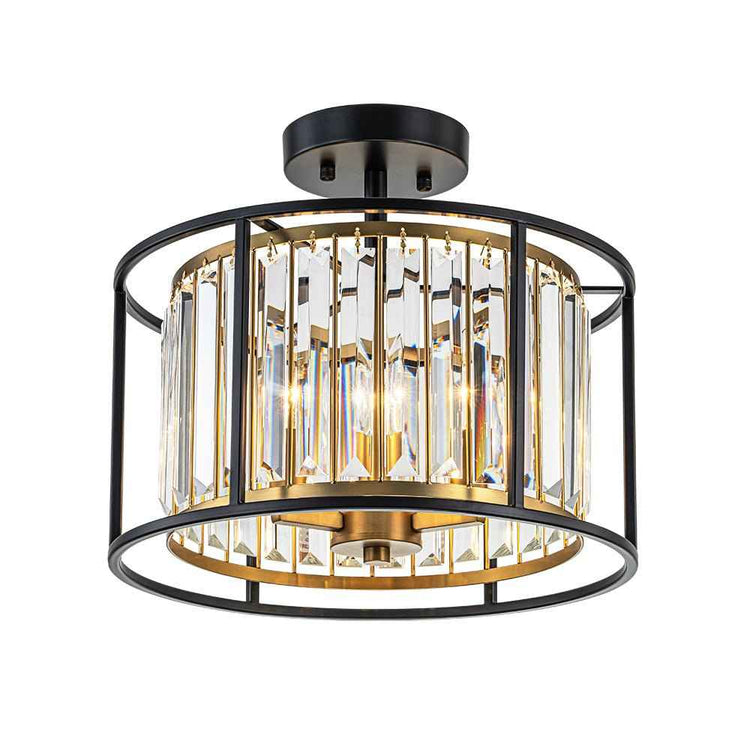 Plafonnier noir à cage de verre, anneaux métal et ampoules visibles au centre.