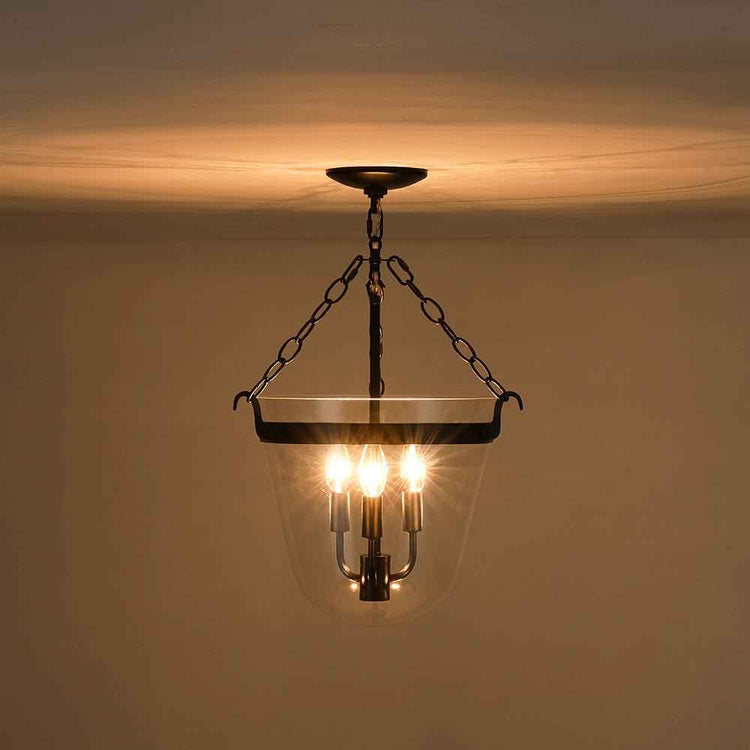 Lustre suspendu noir à 3 lumières, verre transparent, allumé