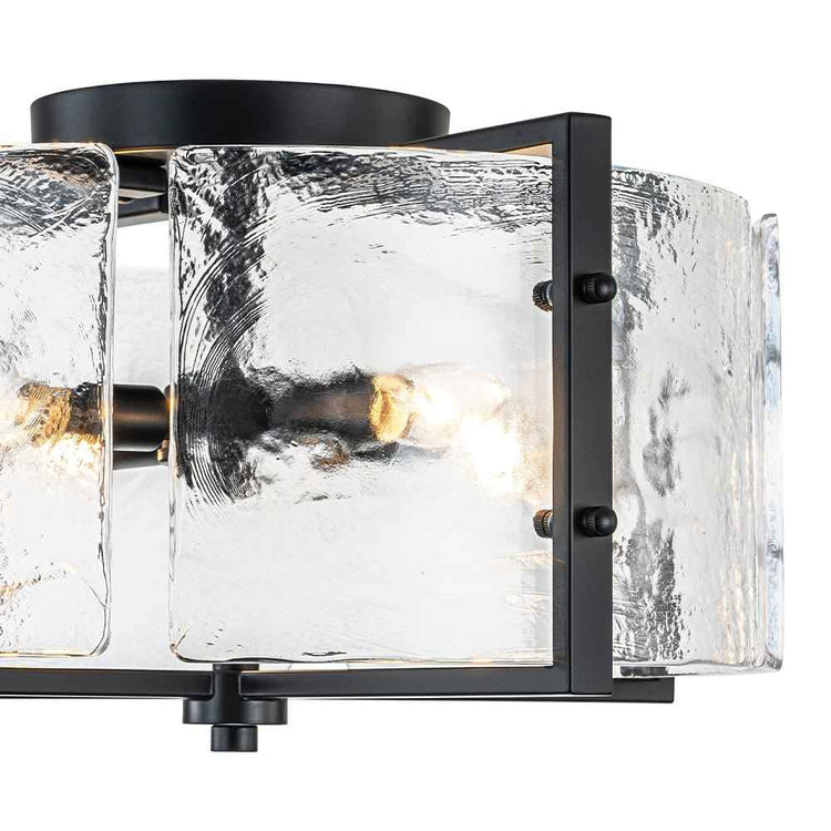 Plafonnier noir, panneau de verre transparent texturé dans un cadre rectangulaire.