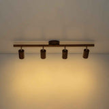 Plafonnier rail 4 spots en bois noyer, barre horizontale et abat-jours cylindriques