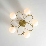 Lustre semi-encastré à 5 globes opales, vue dessous, structure laiton en étoile.