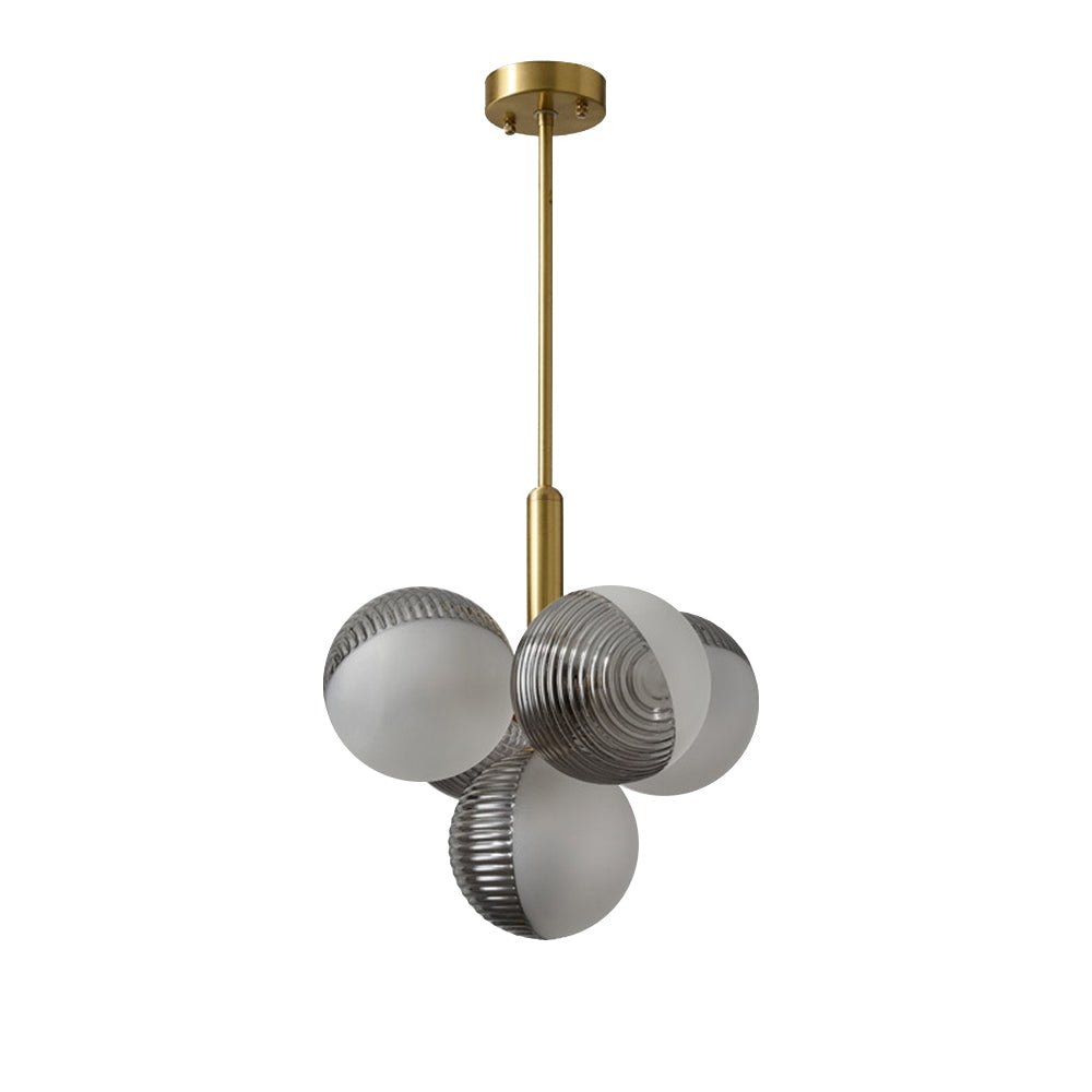 Lustre à boules de verre opale texturé gris, tige laiton et rosace ronde.