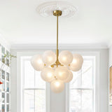 Suspension avec platine ronde dorée et tige laiton, boules opale blanc texturé