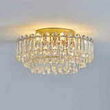 Plafonnier en cristal transparent, capot doré, cristaux brillants allumés