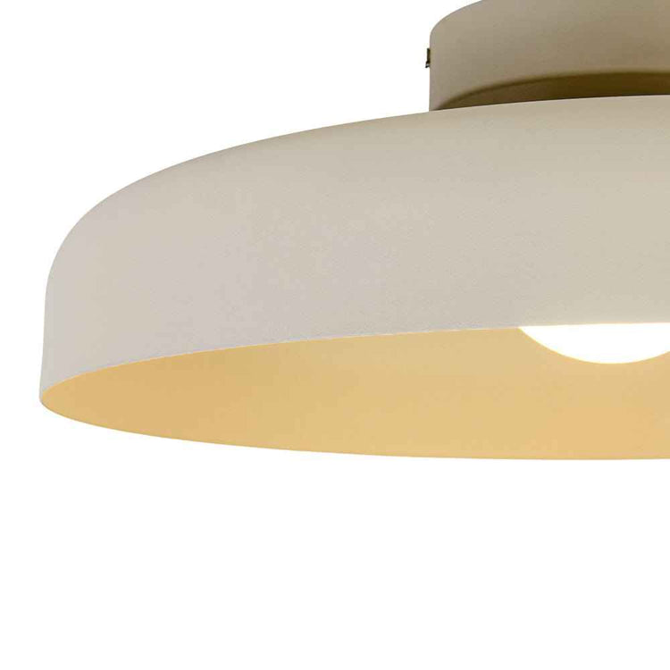 Plafonnier LED dôme, abat-jour beige en forme de tambour, vue de côté avec lumière