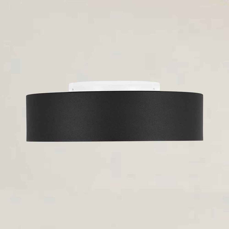 Plafonnier LED noir à bordure dorée, diffuseur blanc visible, installation au plafond.