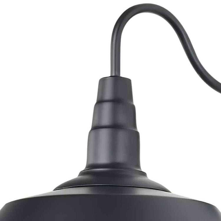 Détail de l’applique murale noire : bras courbé et douille au-dessus du luminaire