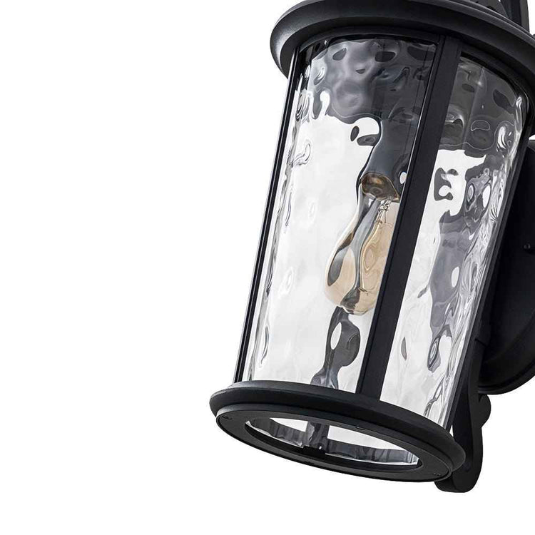 Applique extérieure lanterne IP23 : verre transparent texturé et structure noire.