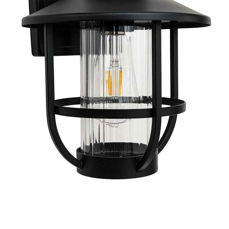Lanterne extérieure noire à verre transparent nervuré et cage métallique, ampoules filaments