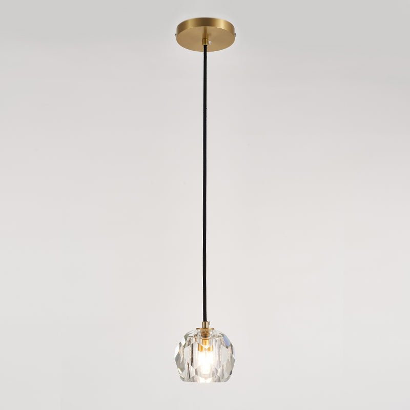Suspension en cristal facetté avec socle rond laiton et tige noire