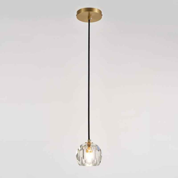 Suspension en cristal facetté avec socle rond laiton et tige noire