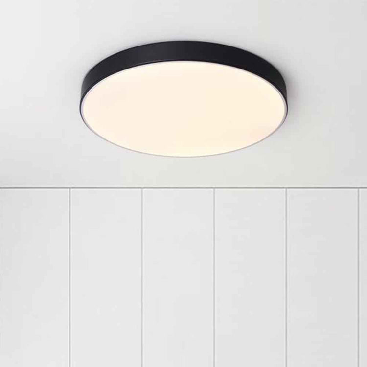 Plafonnier LED rond noir avec diffuseur blanc, format plafond