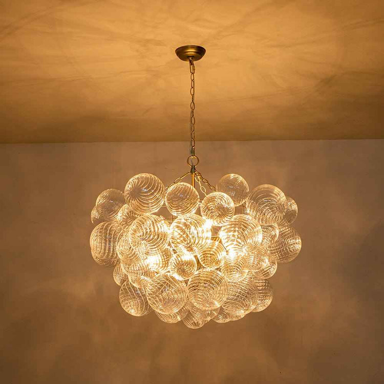 Lustre moderne en verre en grappe, monture laiton, abat-jour ronds transparents