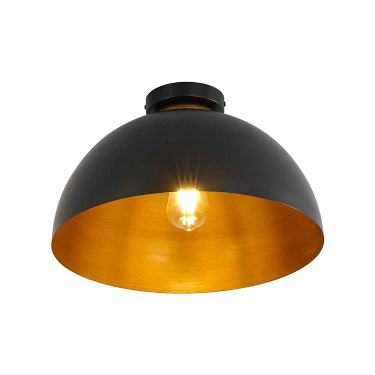 Plafonnier dôme noir à intérieur doré, ampoule allumée au centre, 1 lumière.