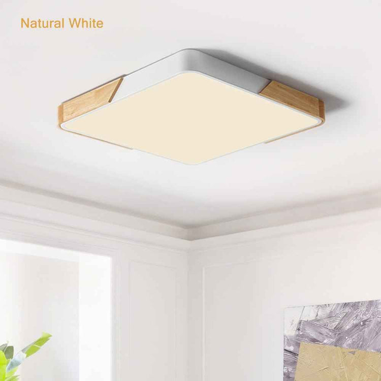 Plafonnier LED carré au plafond, cadre gris, diffuseur clair « Natural White » et bois