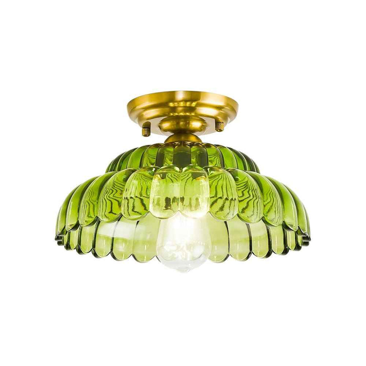 Plafonnier dôme en verre vert nervuré, finition dorée, abat-jour en verre transparent.