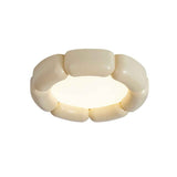 Plafonnier LED en céramique, finition beige, vue rapprochée de l’anneau