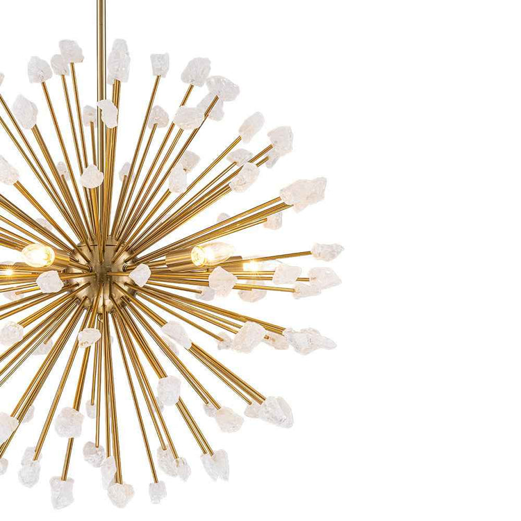Lustre Sputnik en laiton doré, tiges rayonnantes et pierres blanches réparties sur la structure.