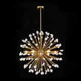 Lustre soleil laiton, tiges rayonnantes et éléments blancs, ampoules allumées